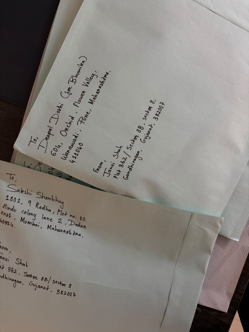 Hand-addressed envelopes prepared for un.paused readers