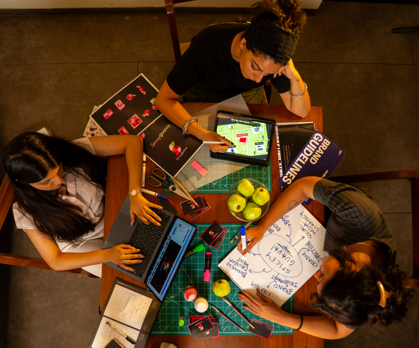Overhead view of the Spicey Guava team working through brand strategy