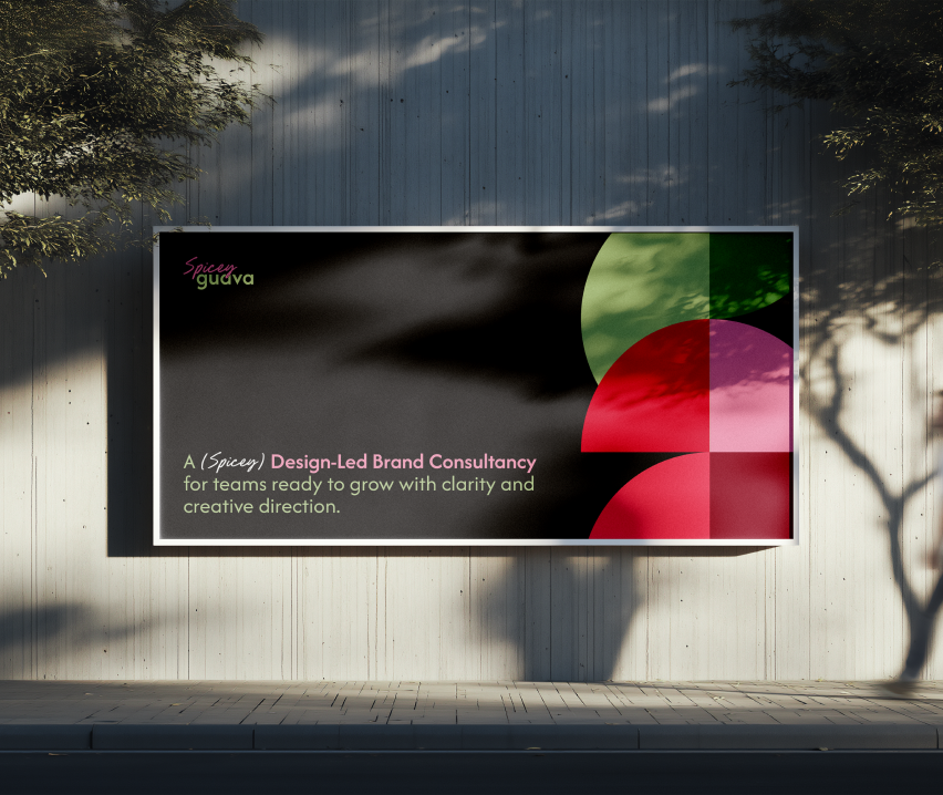Spicey Guava brand consultancy billboard mounted on a sunlit wall